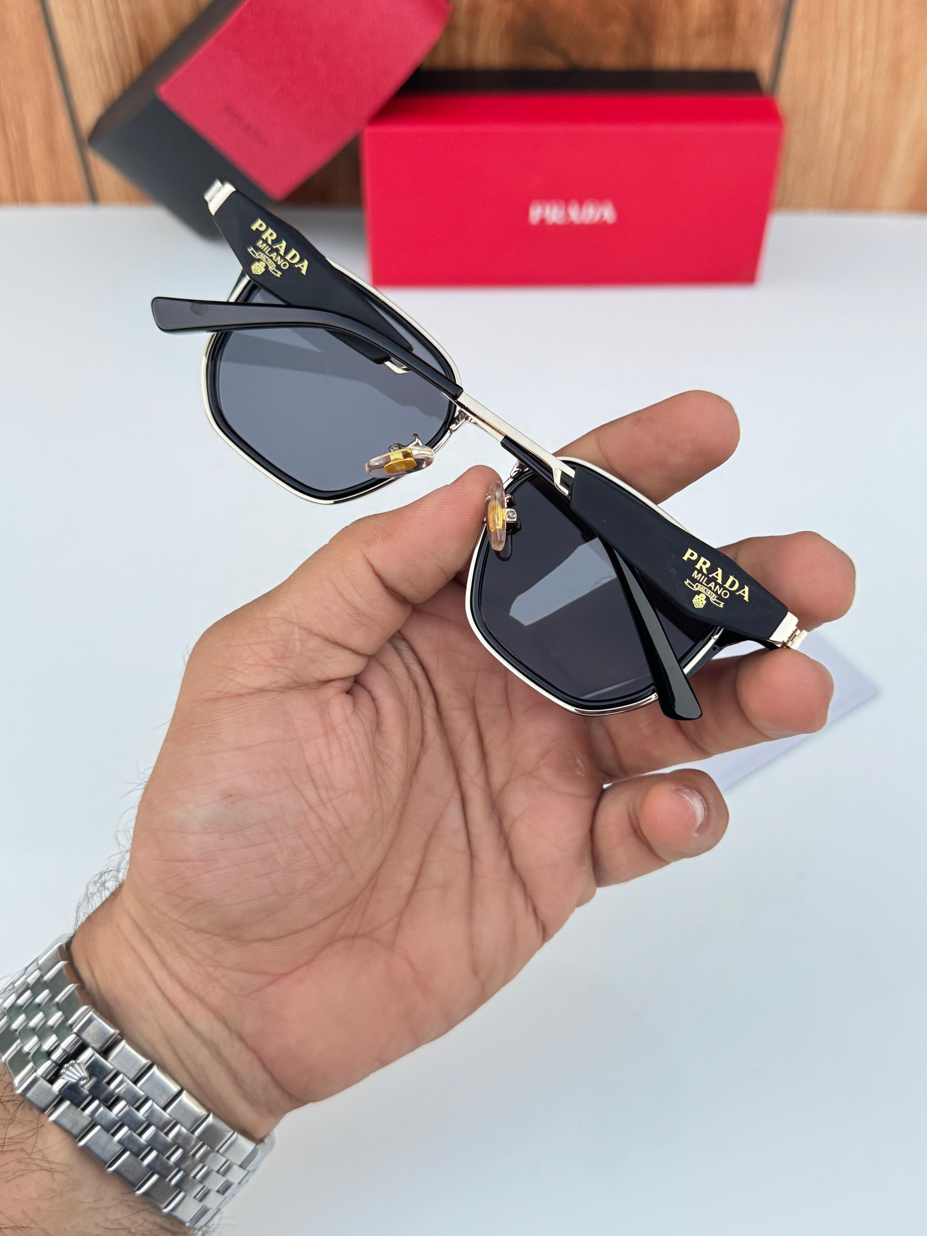 Pr_ada 129 gold black