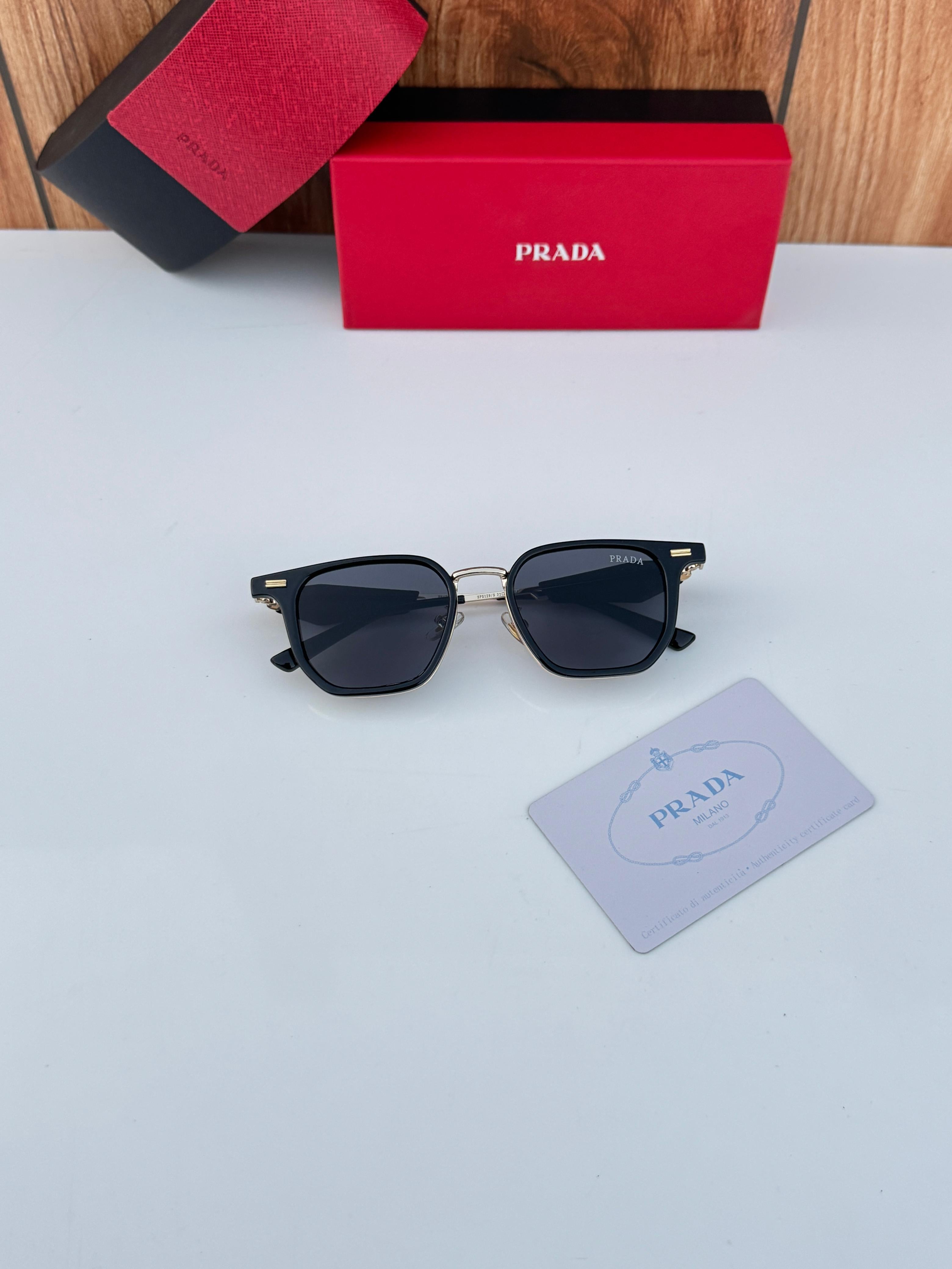 Pr_ada 129 gold black